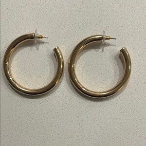 Gold Hoop Earrings with Bold Design